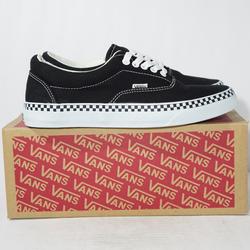 blue vans with checkered foxing