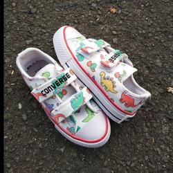 dinosaur infant converse