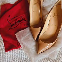 louboutin harga