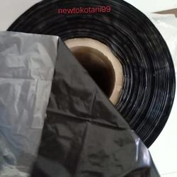 Plastik mulsa hitam perak penutup tanah dan packing lebar 120cm eceran