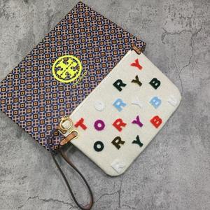 harga dompet tory burch
