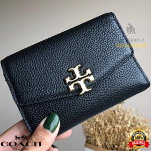 harga dompet tory burch