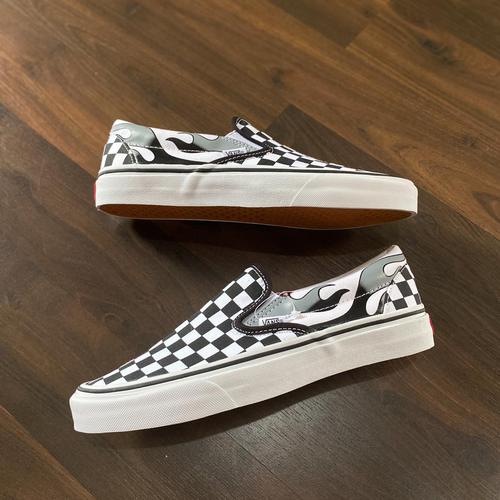 flame checkered slip on vans