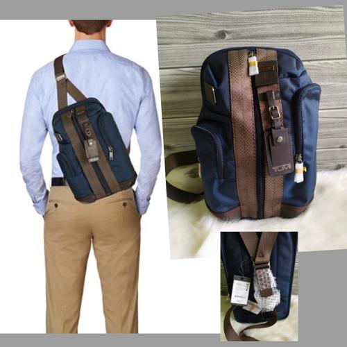 tumi higgins sling
