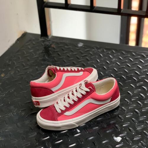 all red vans on feet