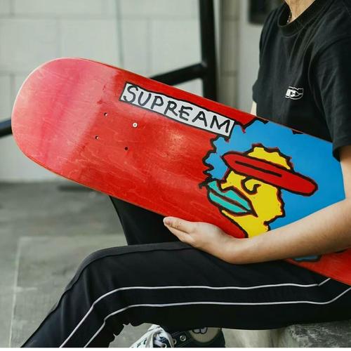 supreme deck on wall