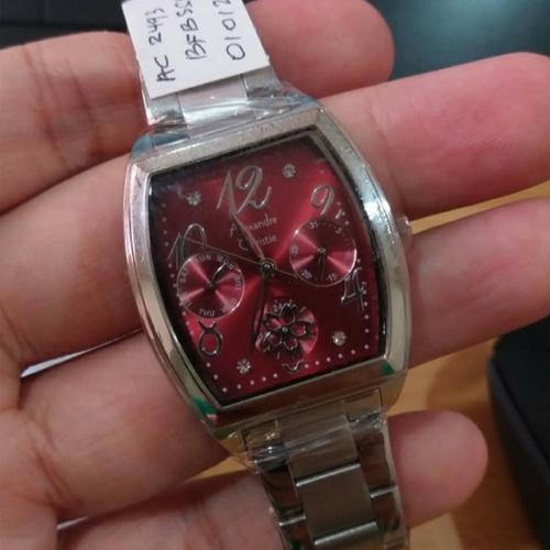 silver and red watch