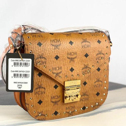 Mcm patricia shoulder bag with studs Color cognac Size 21c di  Topmultibrands Tokopedia