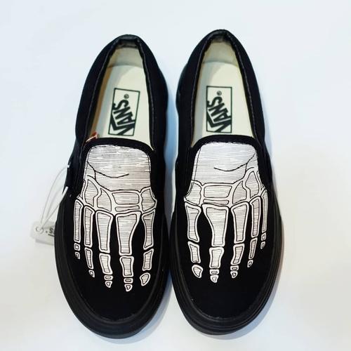 skeleton vans slip ons