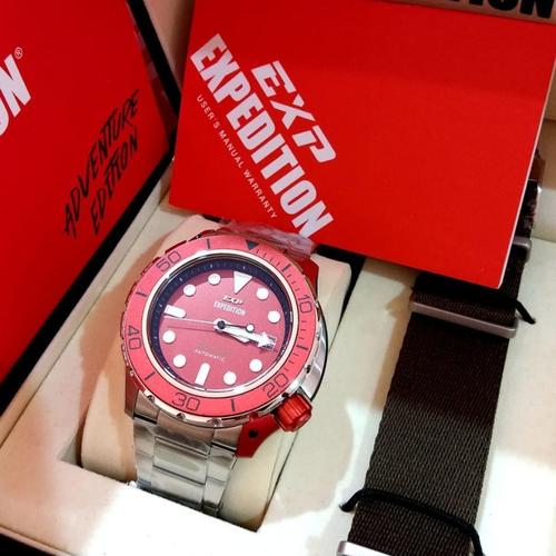 silver and red watch