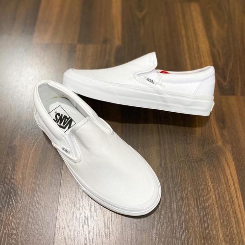 vans white womens slip ons