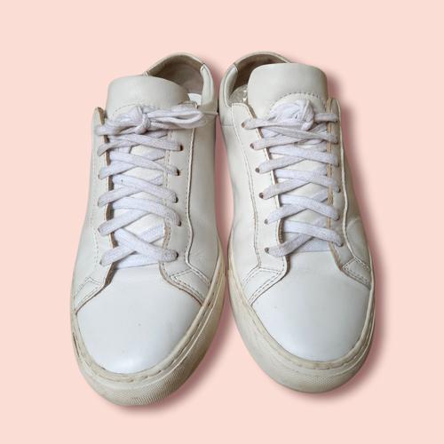 woman by common projects slip on