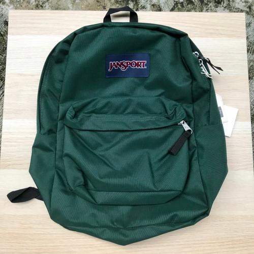 dark green jansport backpack