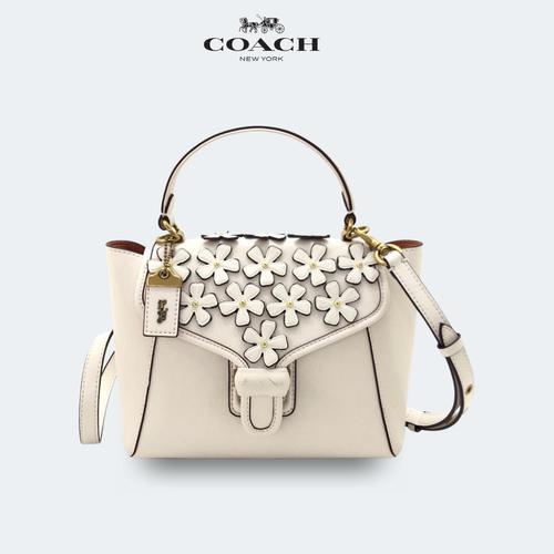 coach courier carryall 23 with floral applique