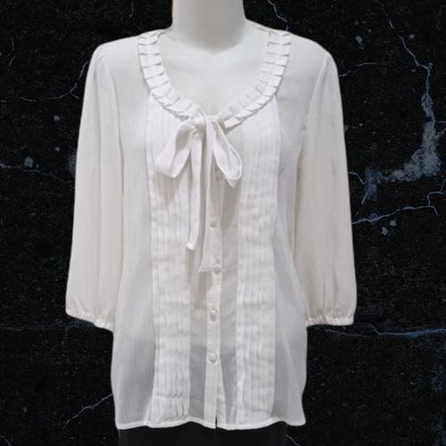 Preloved blus/atasan putih merk Cato 