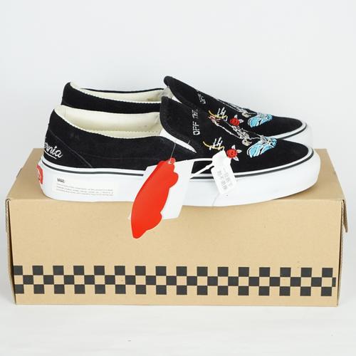 skeleton vans slip ons