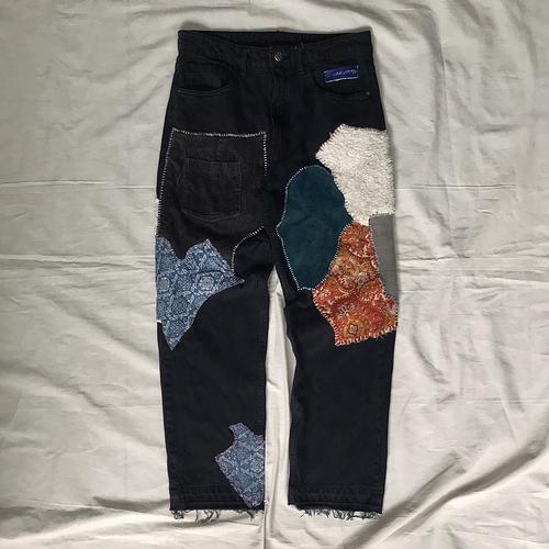 Reworked “Patchwork” Faded Jeans 