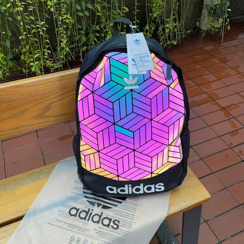 Adidas issey miyake online reflective backpack