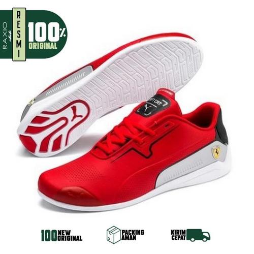 grey and red puma shoes