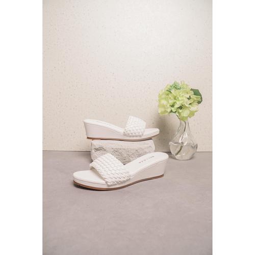 white wedge slip on