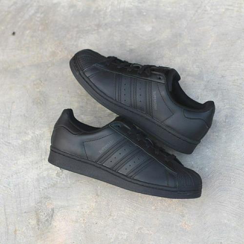 black superstar sneakers