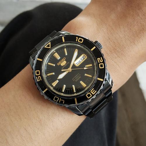 seiko 5 sport black gold fifty fathoms 