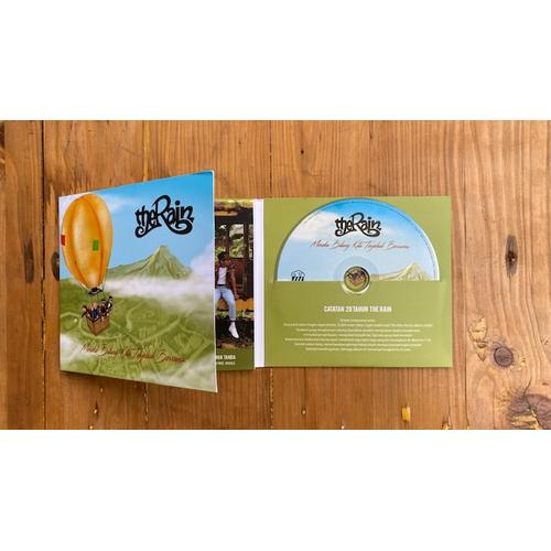 Gambar CD Album Ke-7 The Rain: Mereka Bilang Kita Terjebak Bersama dari The Rain Merch Store Jakarta Timur Tokopedia