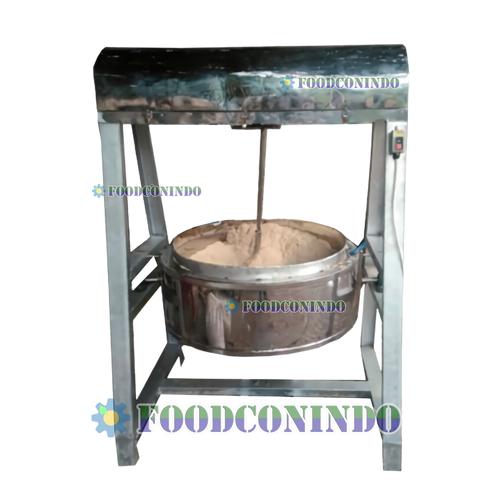 Proses sangrai bahan dalam wajan