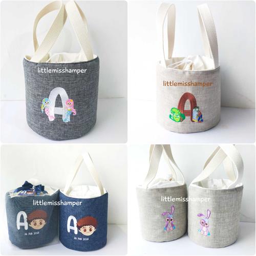 Jual custom tube bordir kanvas tas serut bucket goodie bag souvenir