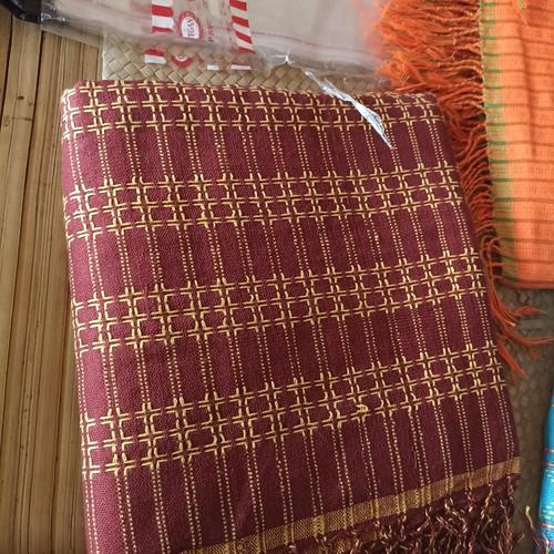 Kain tenun Baduy dengan motif adu mancung