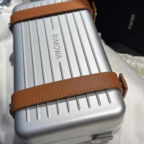 RIMOWA personal crossbody bag aluminum unisex 100% authentic original sling  clutch tas selempang di Thor Shops Tokopedia