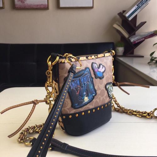 Jual coach mini duffle x snow white 