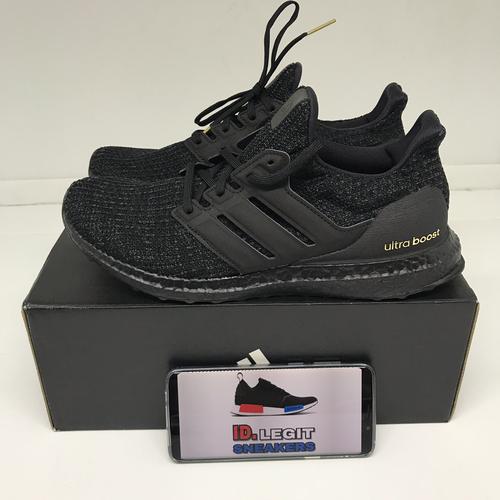 ultraboost triple black gold