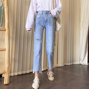 High Light-colored Ripped Jeans 