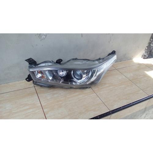 Foto Produk head lamp toyota yaris 2014 kiri dari arka jaya motor
