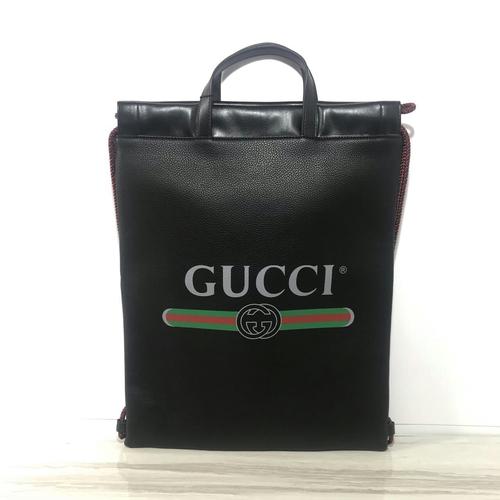 GUCCI PRINT LEATHER DRAWSTRING BACKPACK 