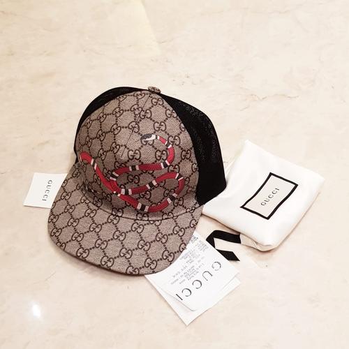 harga cap gucci