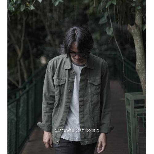 green jacket and jeans