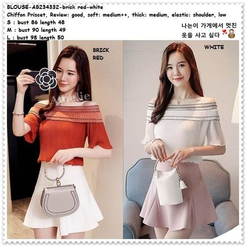 white and orange blouse