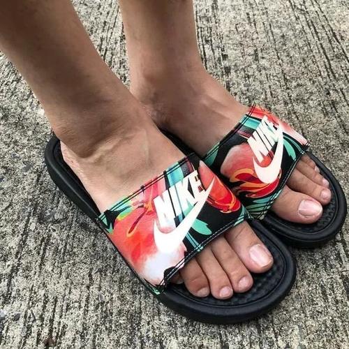 nike floral flip flops