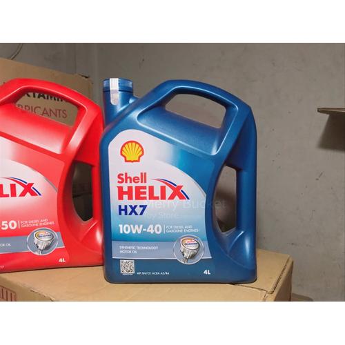 Foto Produk Oli Mesin Oli Mobil Bensin Diesel Shell Helix HX 7 Blue 4 Liter dari tasya galery baru