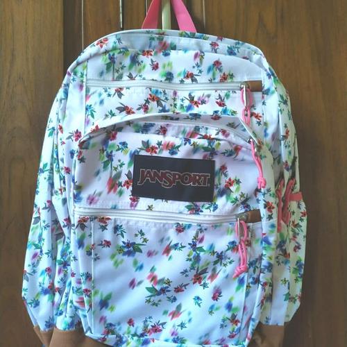 white floral jansport backpack