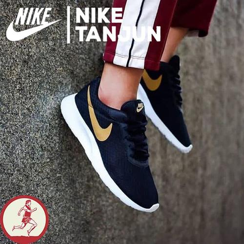 nike tanjun black gold original