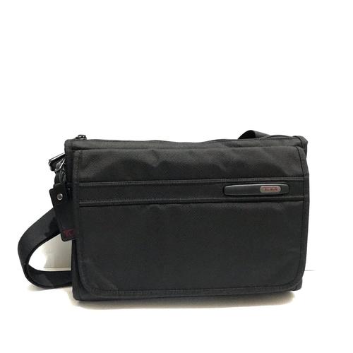 tumi flap zip crossbody