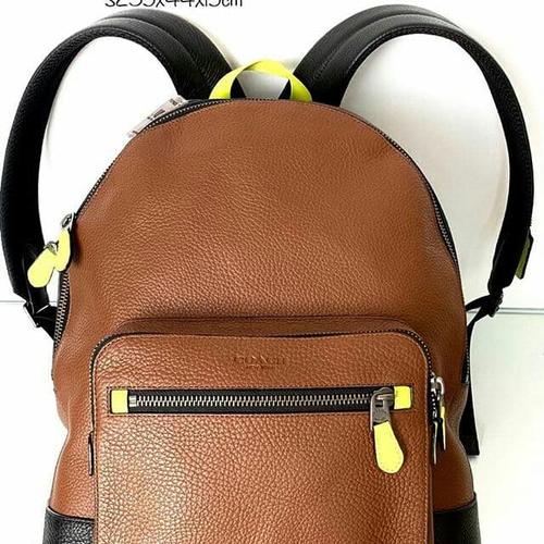 orange coach backpack