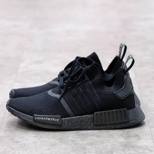 Foto Produk Adidas NMD R1 PK Japan Triple Black dari Level Up Sneakers