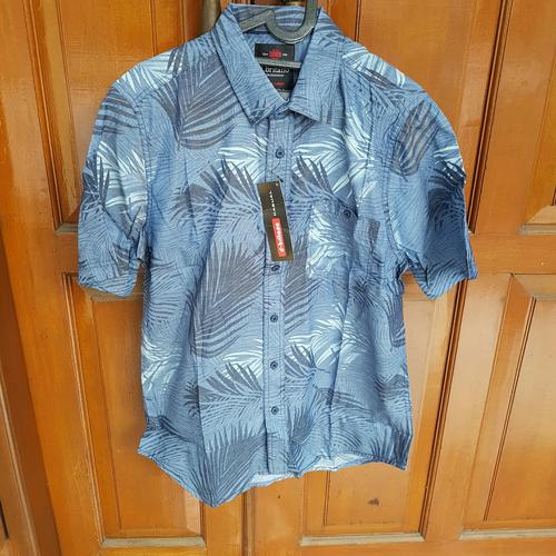 Gambar KEMEJA BIRU MOTIF DEDAUNAN dari UAV Jakarta Selatan Tokopedia