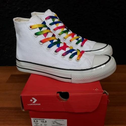 white converse with rainbow