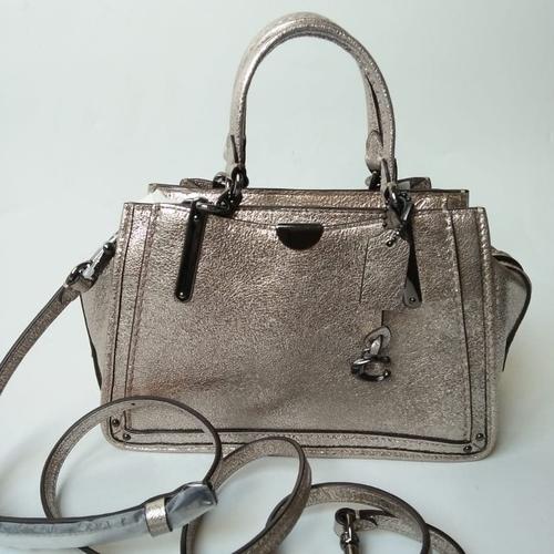 Foto Produk Coach Dreamer metallic 21 Platinum dari ferliarj16