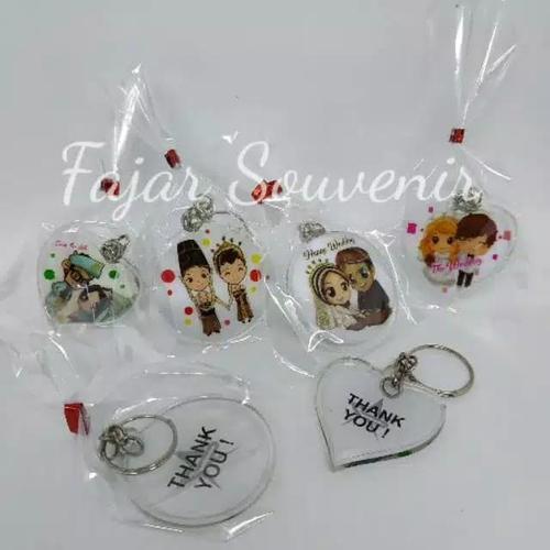 Foto Produk Souvenir Pernikahan Gantungan Kunci Pengantin Bening dari Fajar Souvenir murah